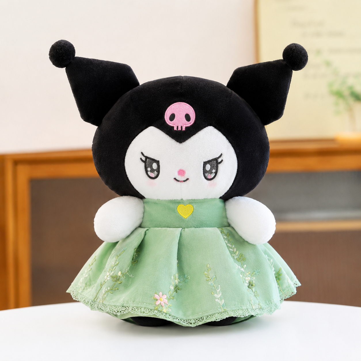 Sanrio Kuromi plush doll wearing a green princess skirt